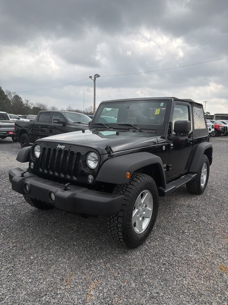 Used 2015 Jeep Wrangler Sport with VIN 1C4GJWAG4FL706373 for sale in Albertville, AL
