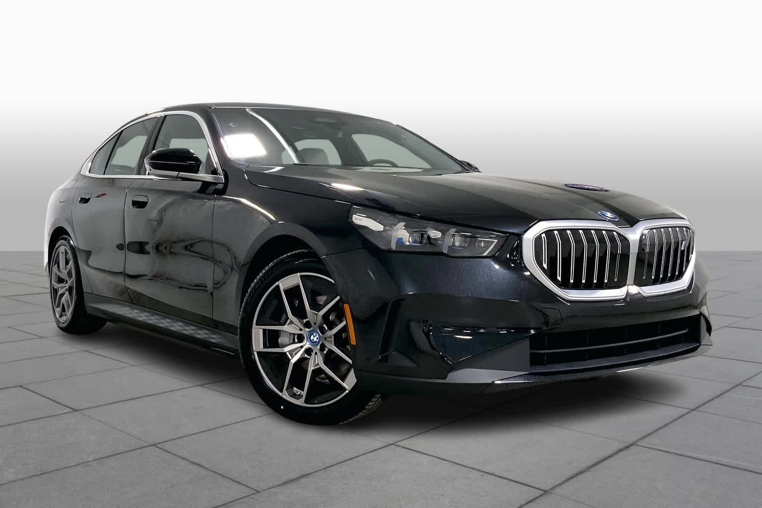 Used 2024 Black Sapphire Metallic BMW eDrive40 image 2