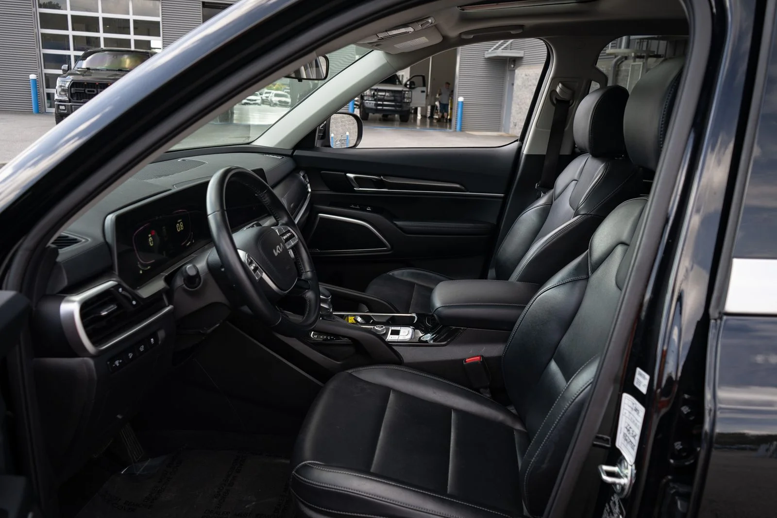Used 2025 Ebony Black Kia S image 14