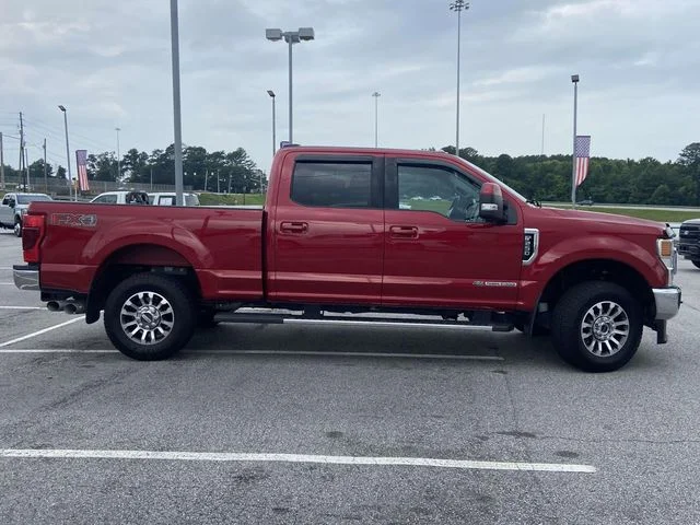 Certified Used 2021 Red Metallic Ford Lariat image 2