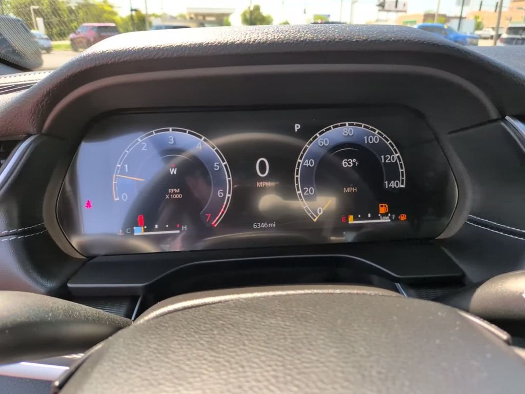 Certified Used 2025 White Jeep Altitude image 24
