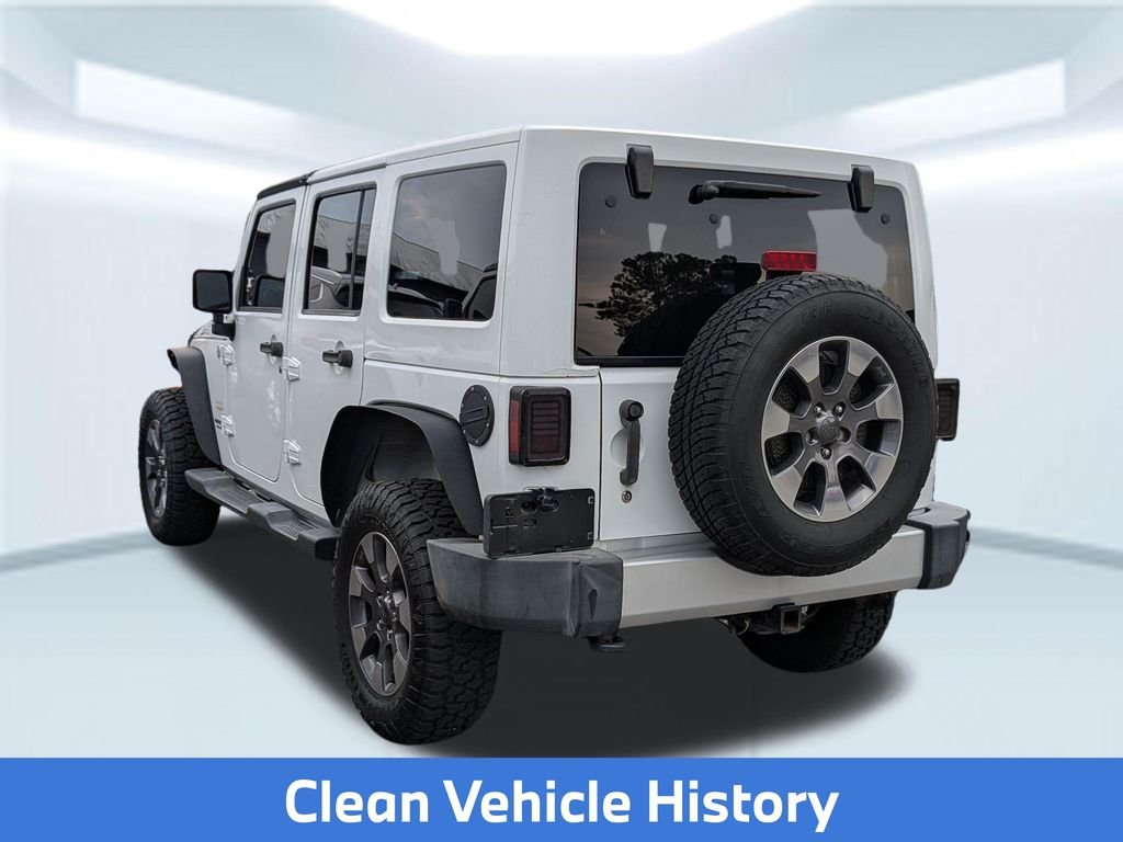 Used 2012 Jeep Wrangler Unlimited Sahara with VIN 1C4BJWEG0CL206050 for sale in Foley, AL