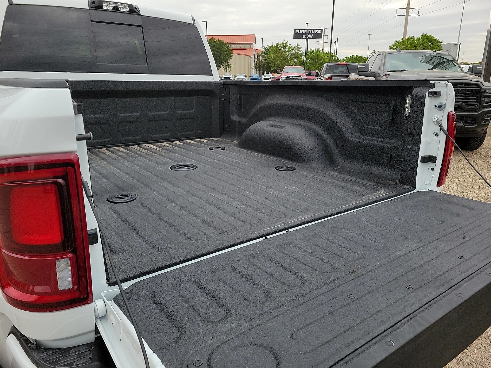 New 2026 PW7 Bright Whit Ram LARAMIE MEGA CAB 4X4 6
