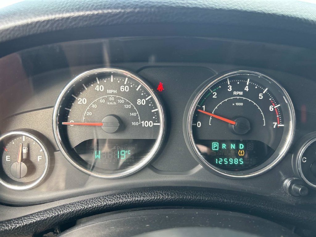 Used 2011 Flame Red Jeep Sport image 27