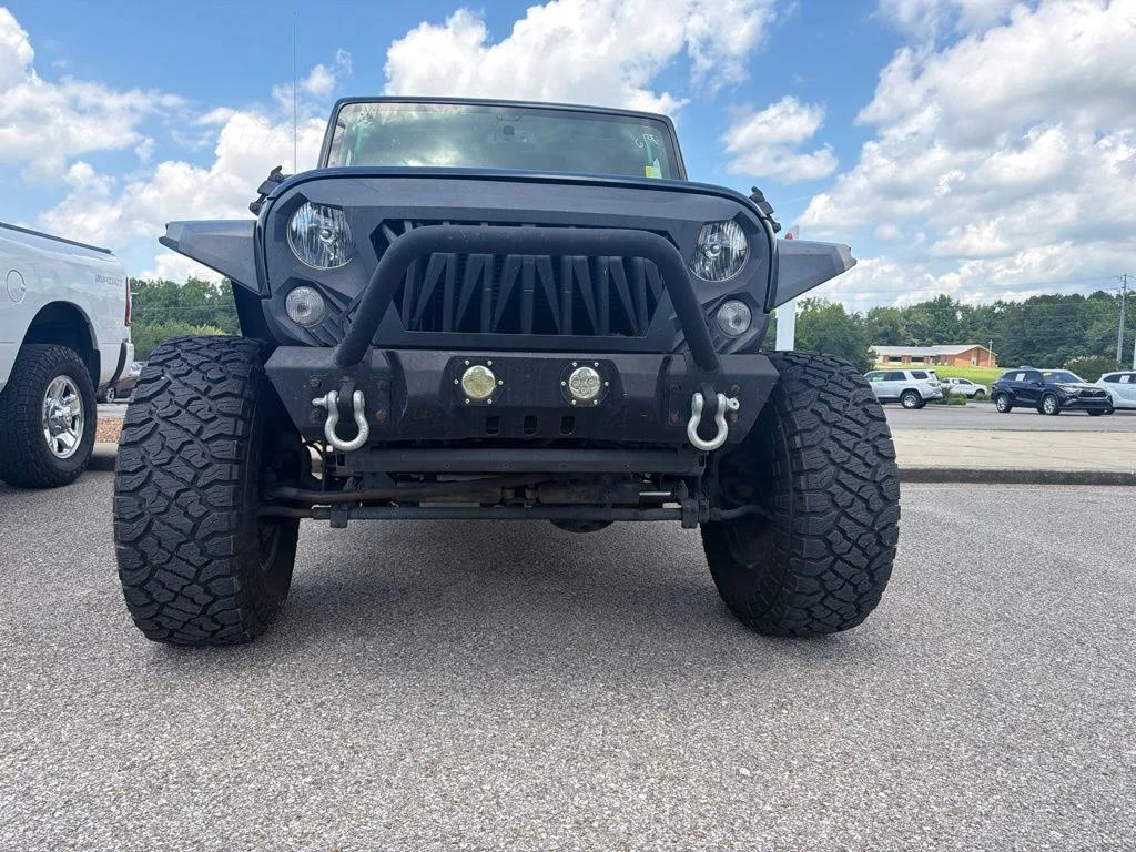 Used 2015 Black Jeep Unlimited Sport image 12