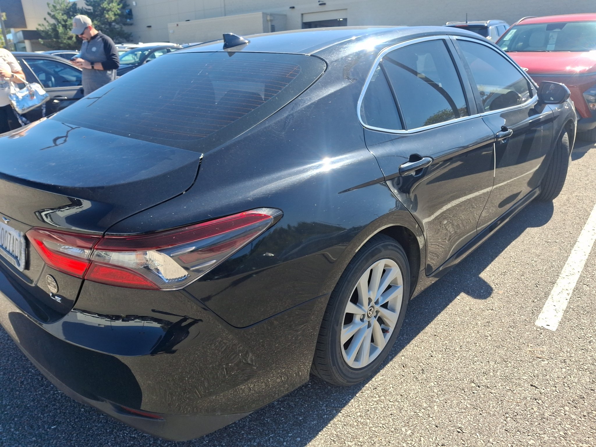 Used 2022 Midnight Black Metallic Toyota LE image 2