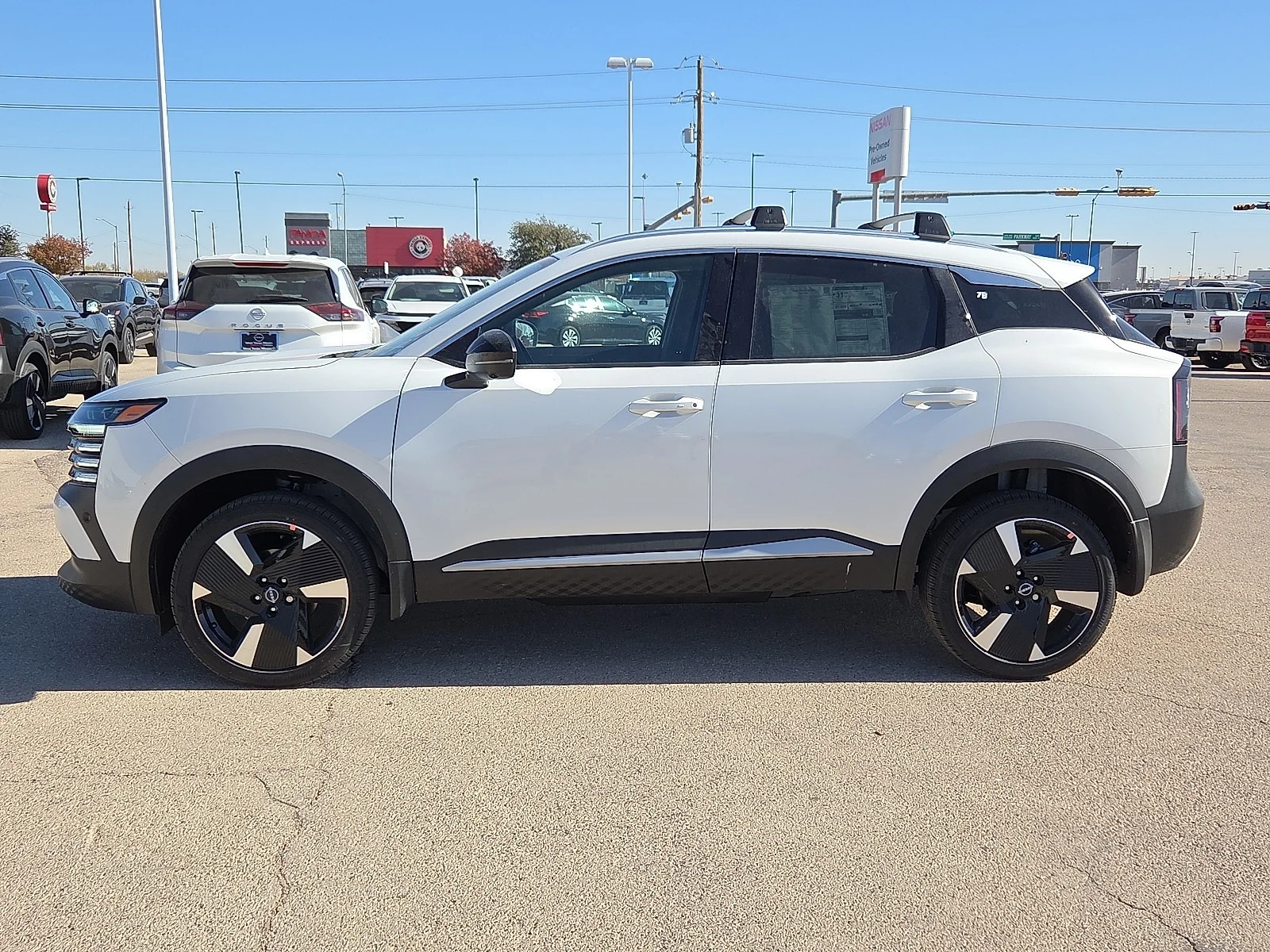 New 2026 QAC Aspen Whit Nissan SR Front-Wheel Drive image 2