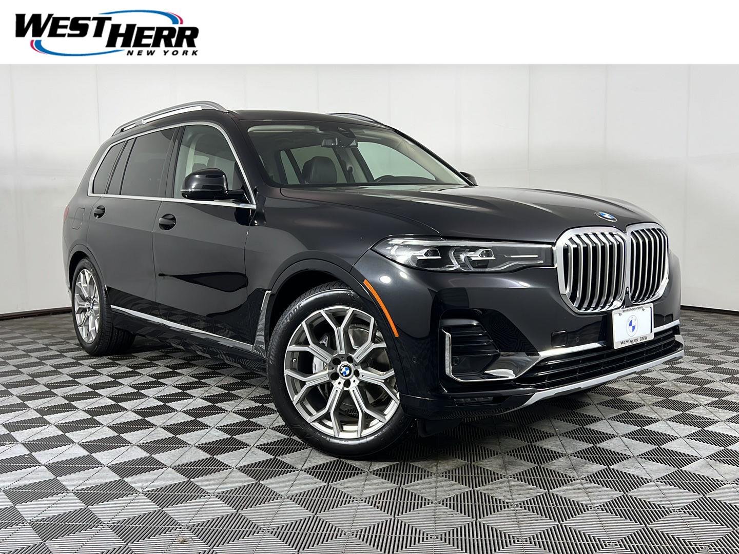 Used 2022 Black Sapphire Metallic BMW xDrive40i image 1