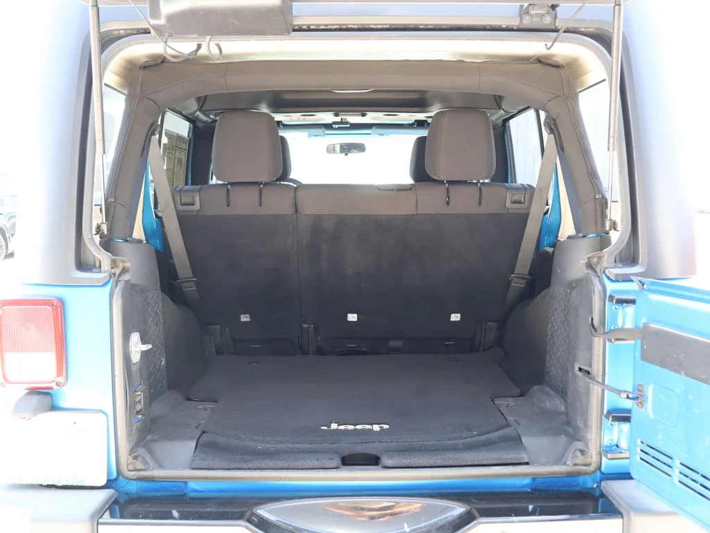 Used 2014 Blue Jeep Unlimited Sport image 13