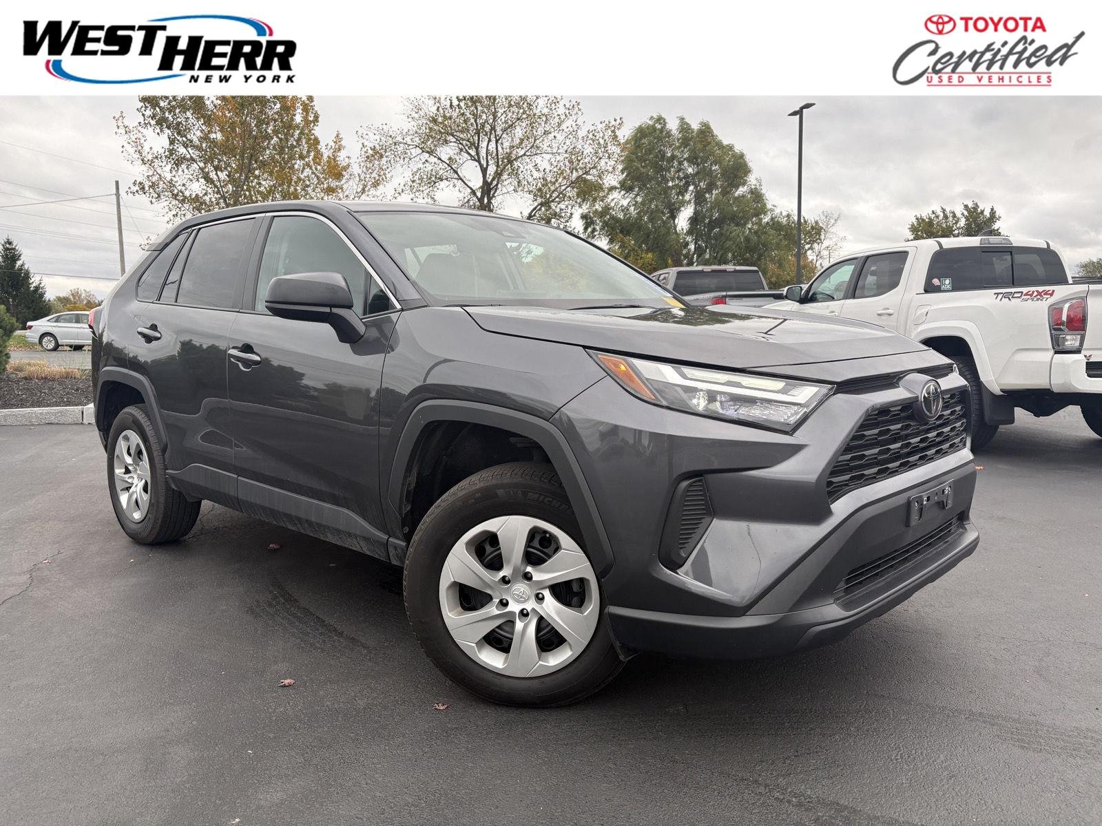 Used 2023 Magnetic Gray Metallic Toyota LE image 1