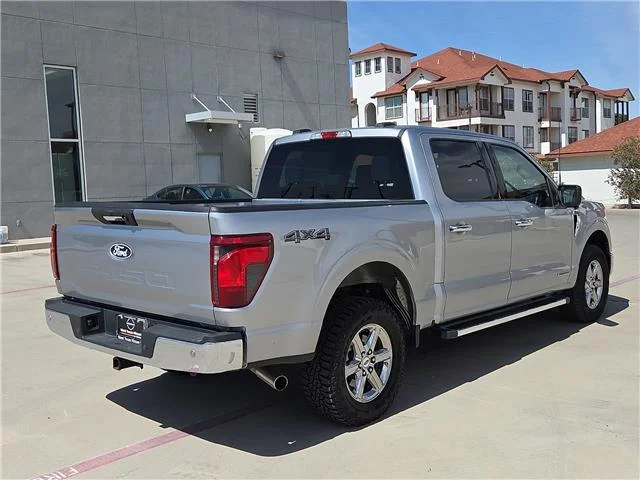Used 2024 Iconic Silver Metallic Ford XLT 4x4 SuperCrew Cab 5.5 ft. box 145 in. WB image 4