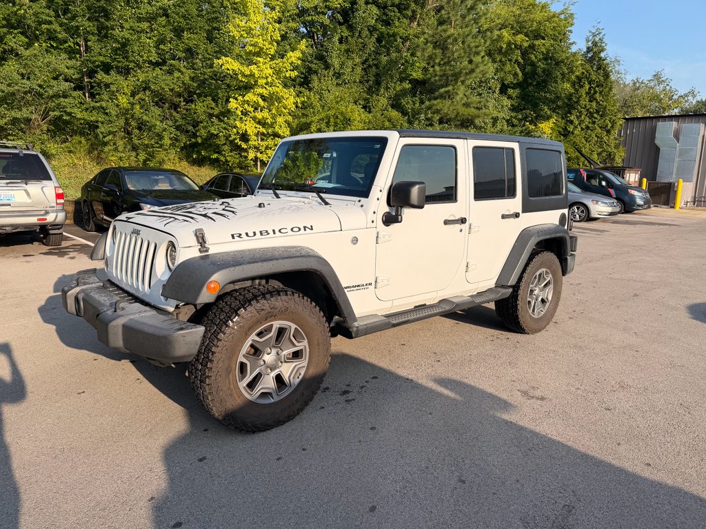 Used 2016 Bright White Clearcoat Jeep Rubicon image 1