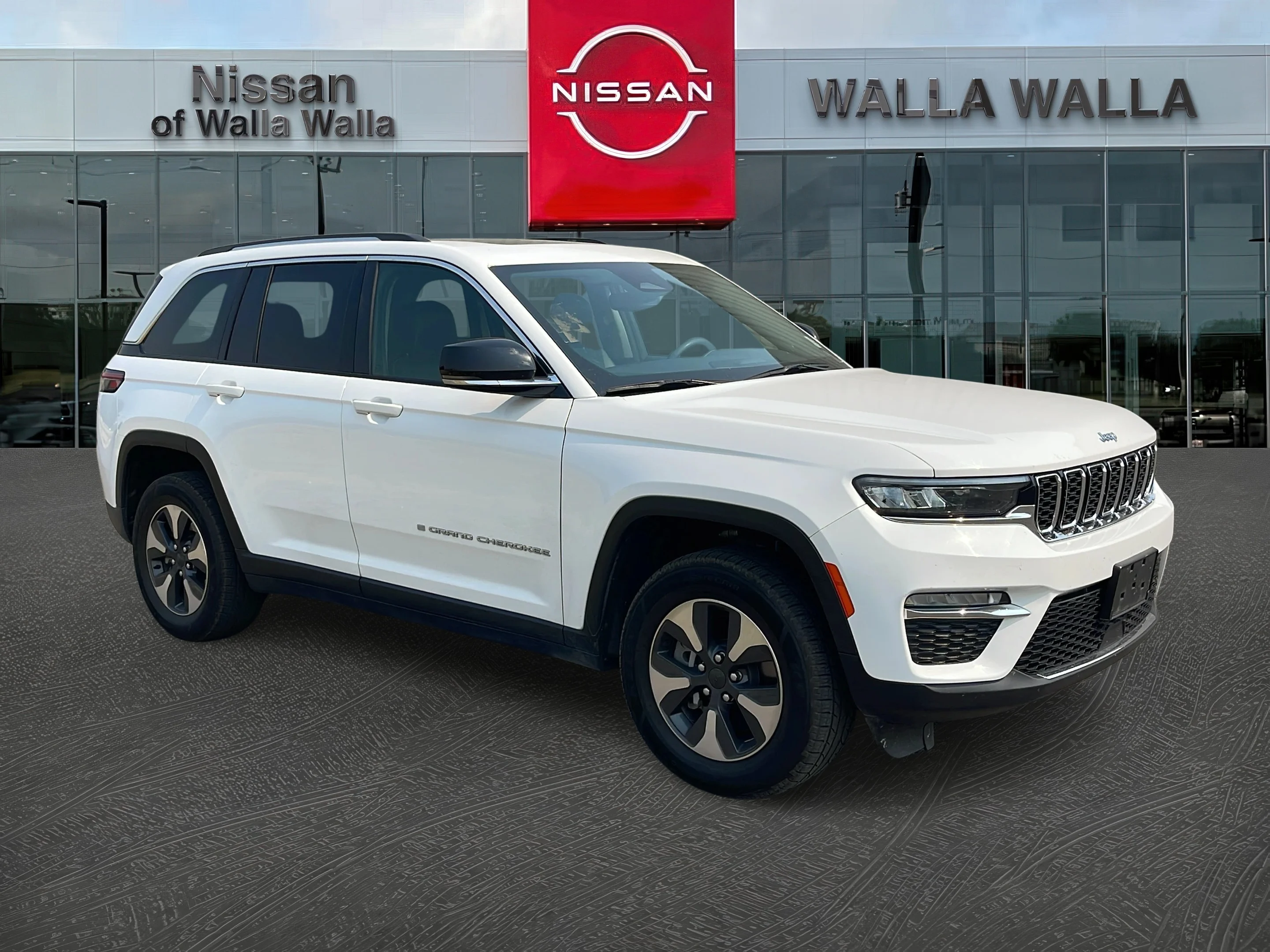 Used 2024 Bright White Clearcoat Jeep 4xe image 1