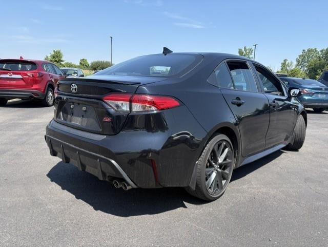 Used 2023 Midnight Black Metallic Toyota SE image 5