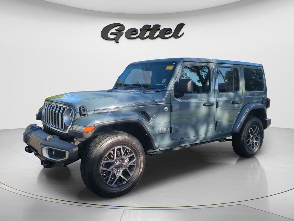 Used 2024 Gray Jeep Sahara image 1