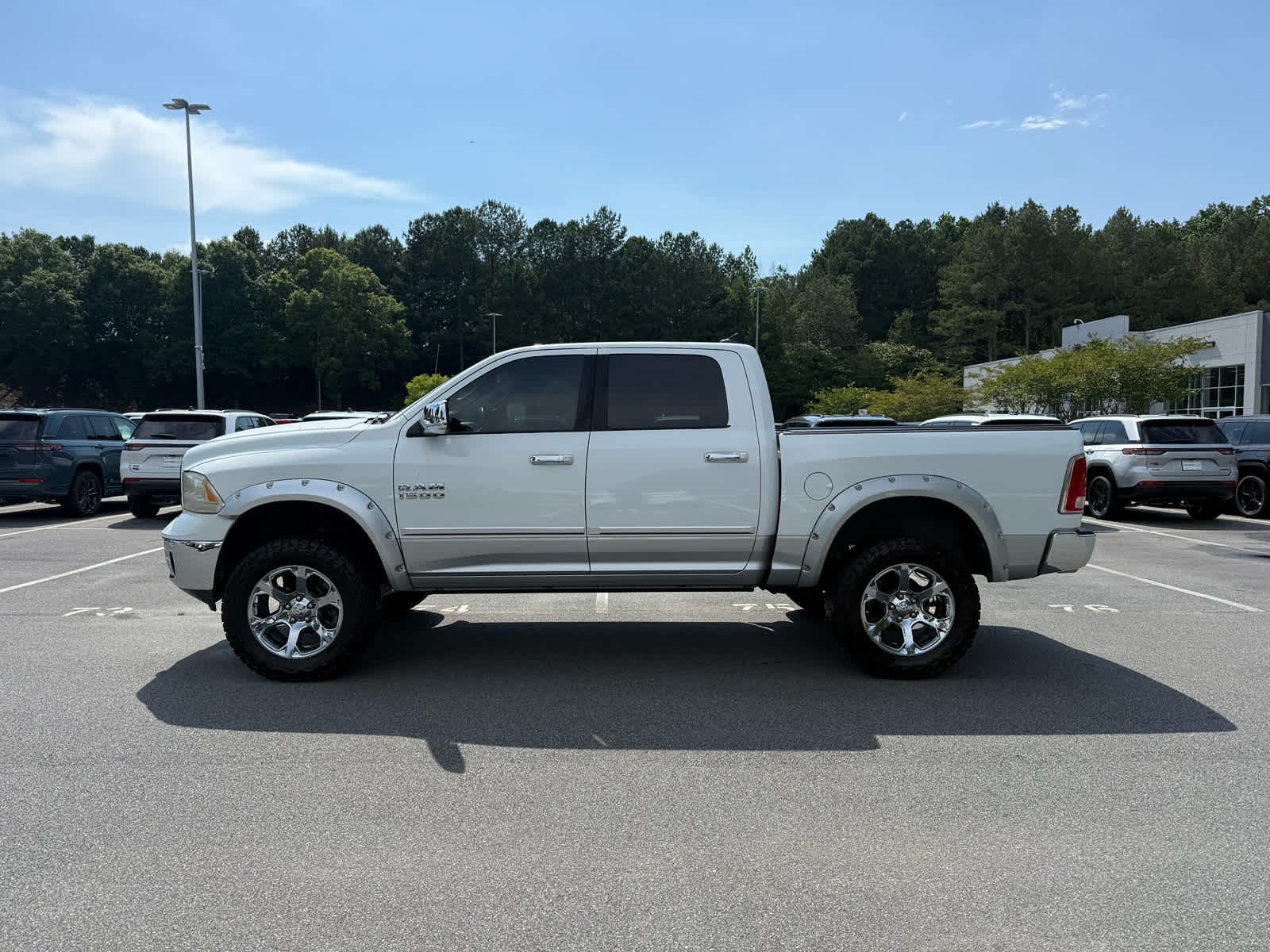Used 2015 RAM Ram 1500 Pickup Laramie with VIN 1C6RR7NTXFS738076 for sale in Woodstock, GA