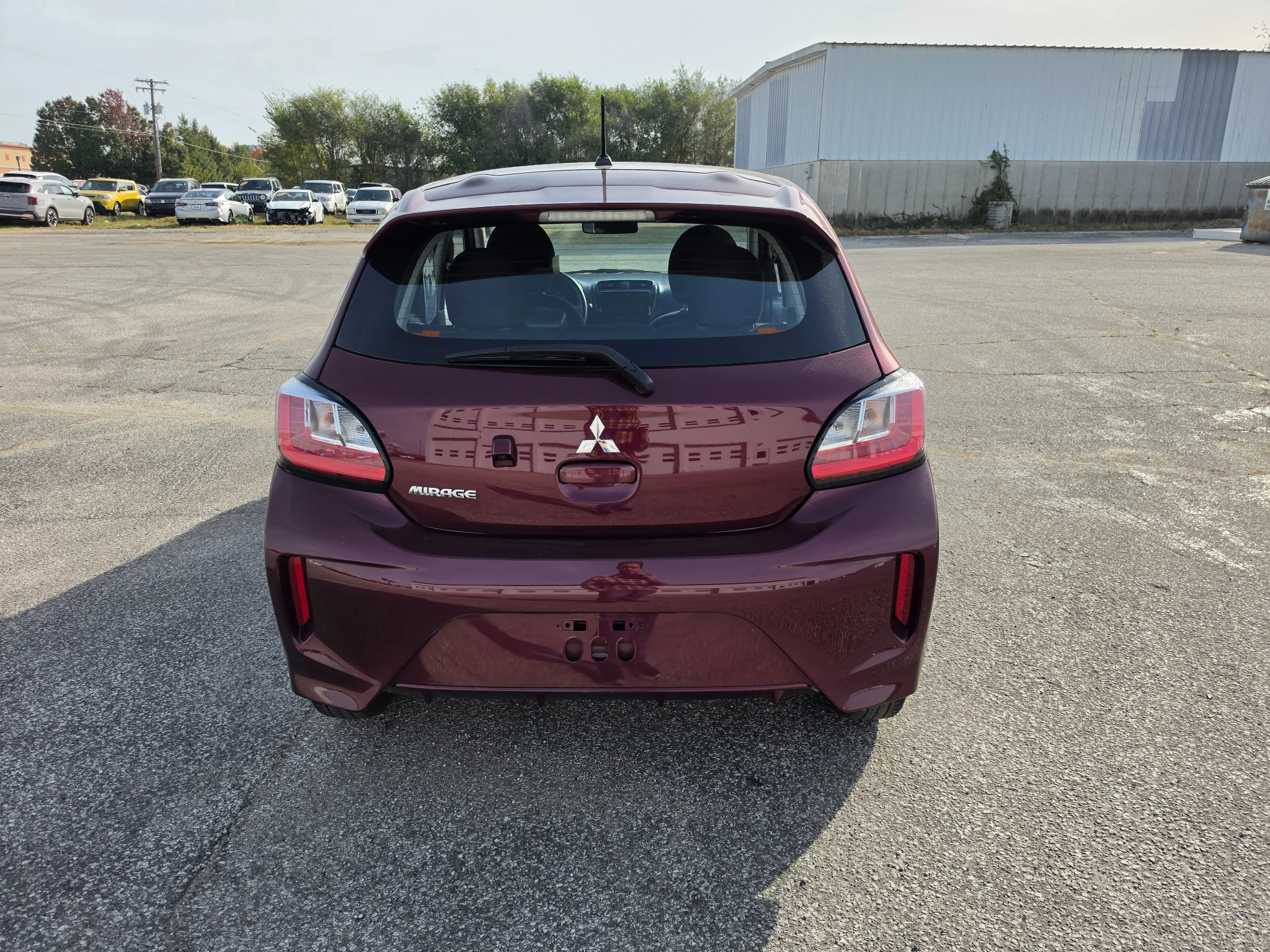Used 2024 Wine Red Metallic Mitsubishi ES image 5