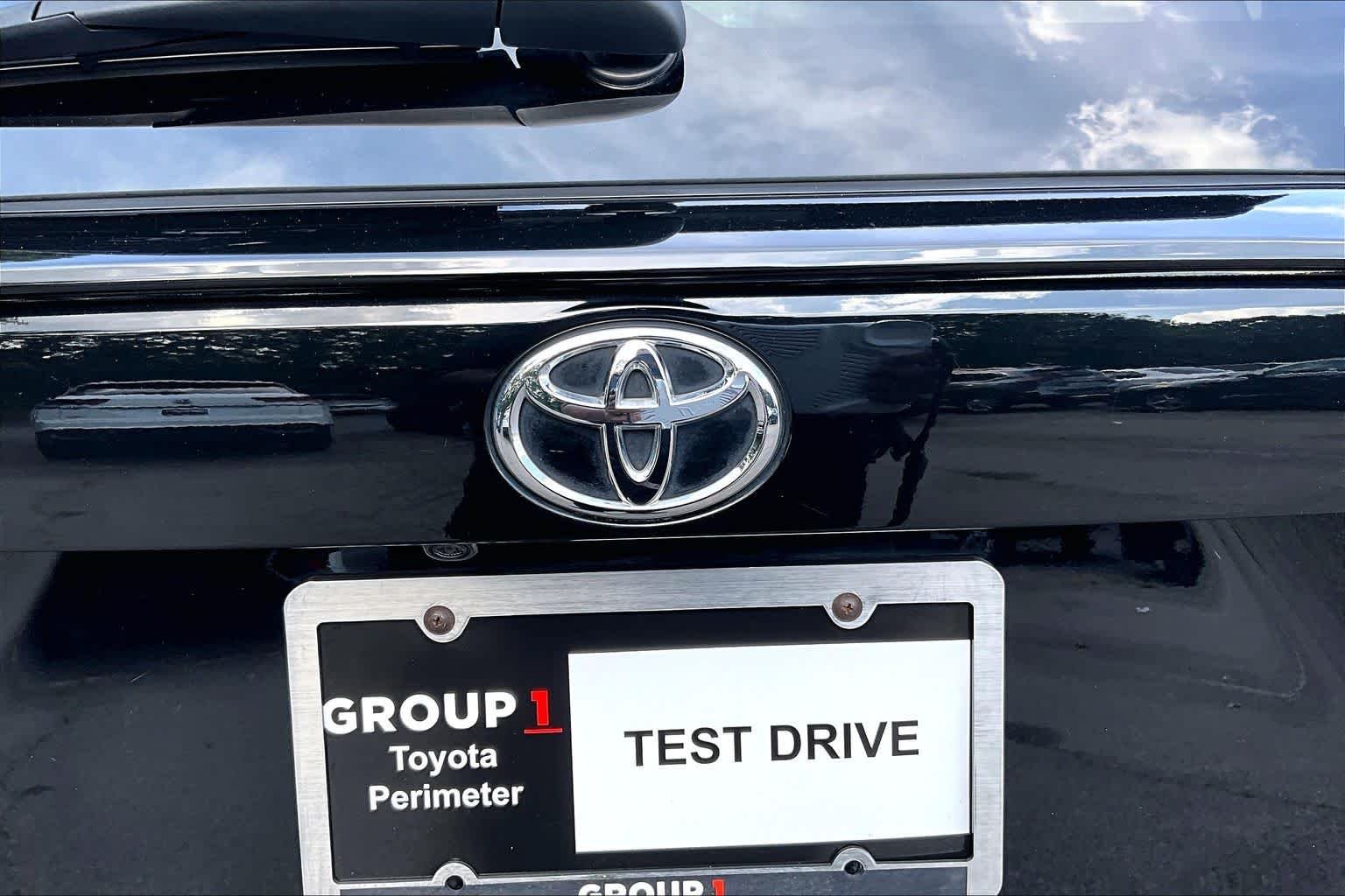 Used 2022 Midnight Black Metallic Toyota LE image 31