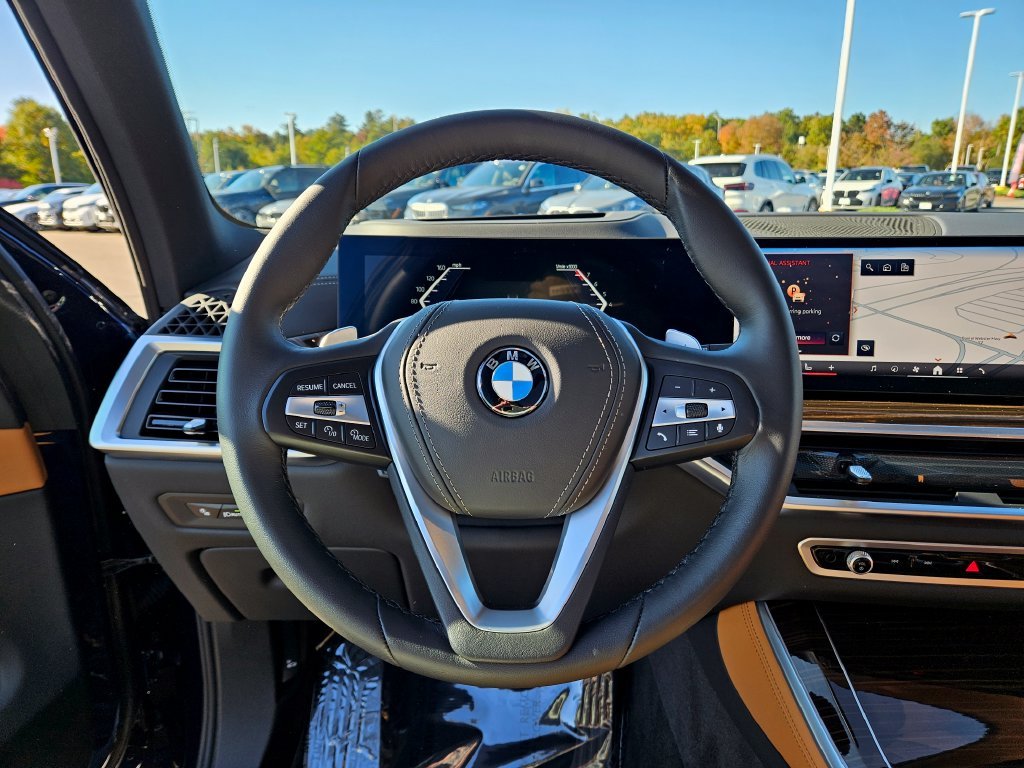 Certified Used 2026 Tanzanite Blue II Metallic BMW xDrive40i image 25