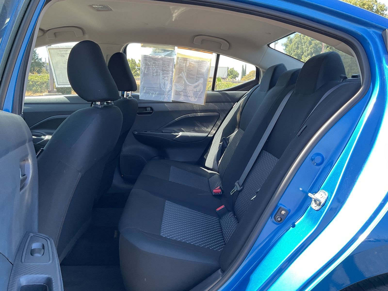 Used 2024 Electric Blue Metallic Nissan S image 7