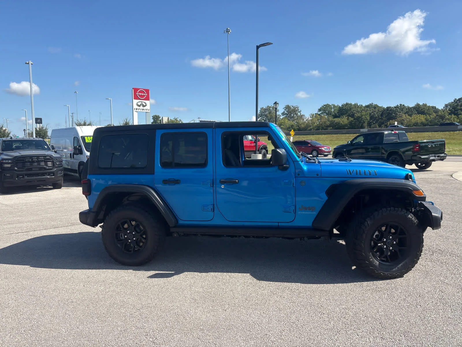 Used 2024 Hydro Blue Pearlcoat Jeep Willys image 11