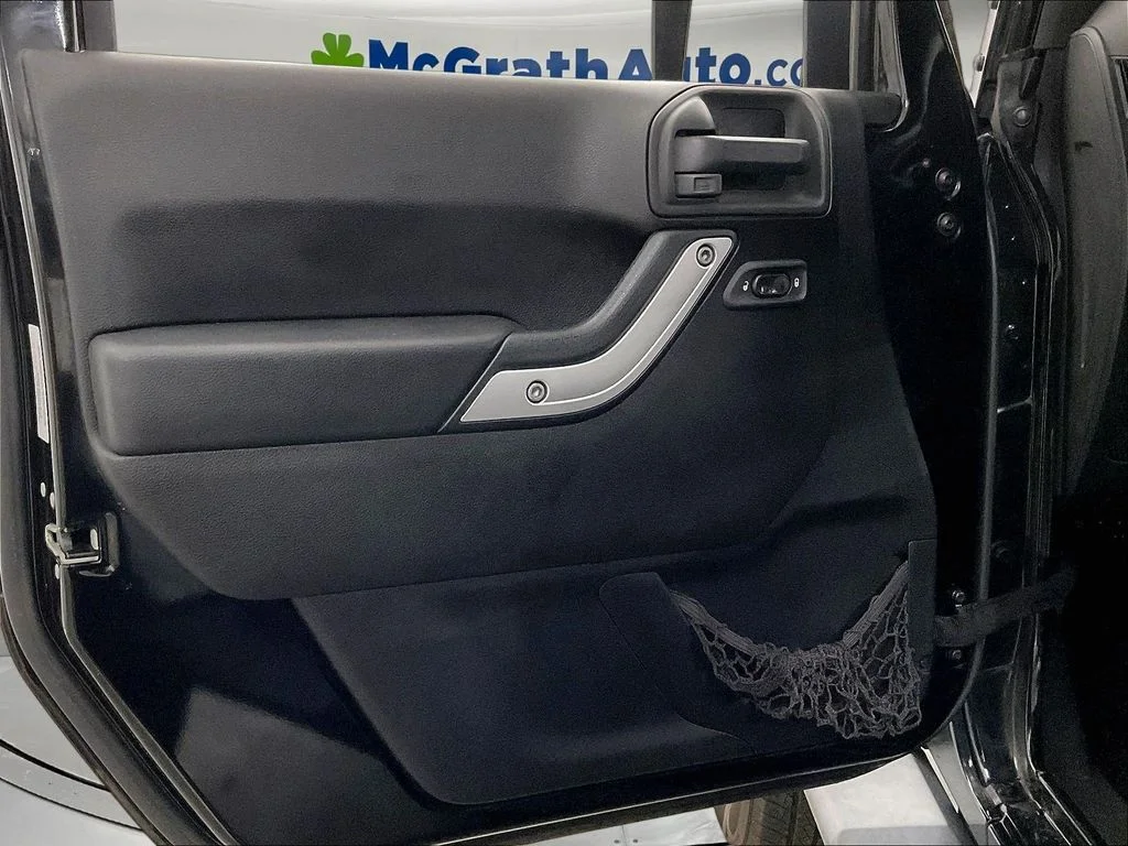 Used 2013 Black Jeep Unlimited Sahara image 27