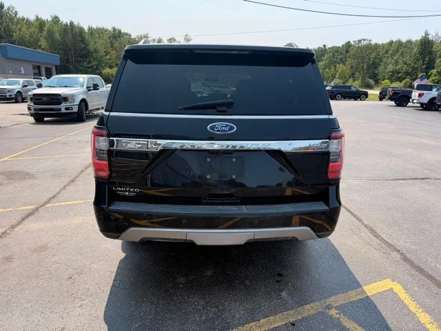 Used 2021 Black Metallic Ford Limited image 4