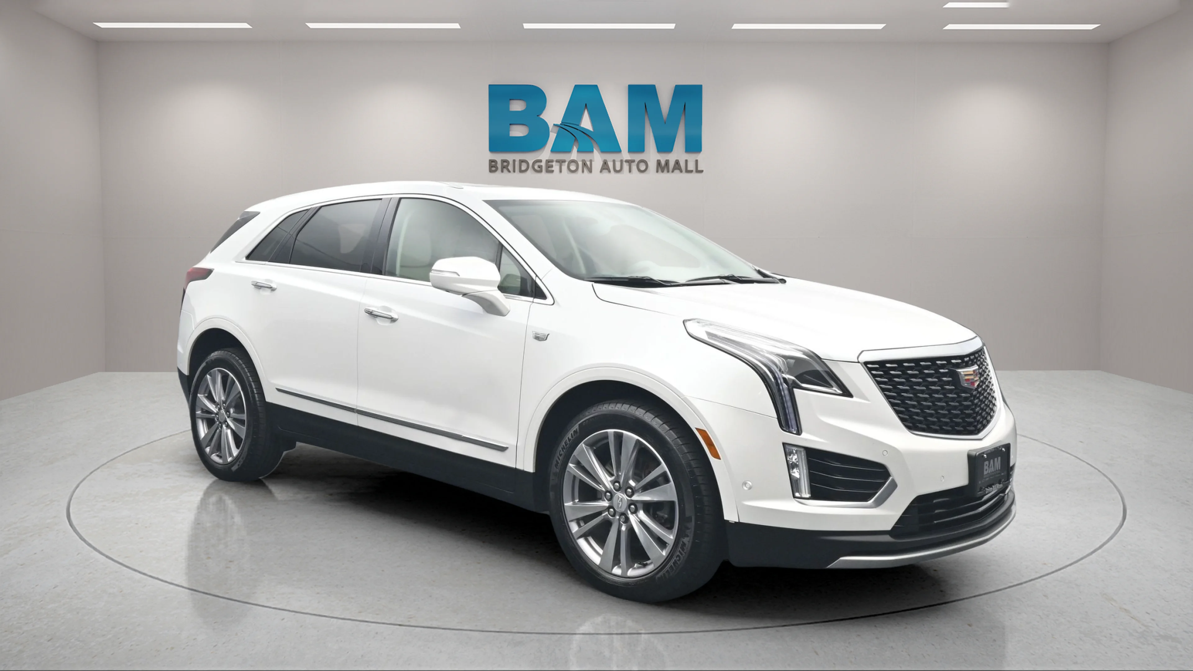 Used 2024 Crystal White Tricoat Cadillac AWD Premium Luxury image 1