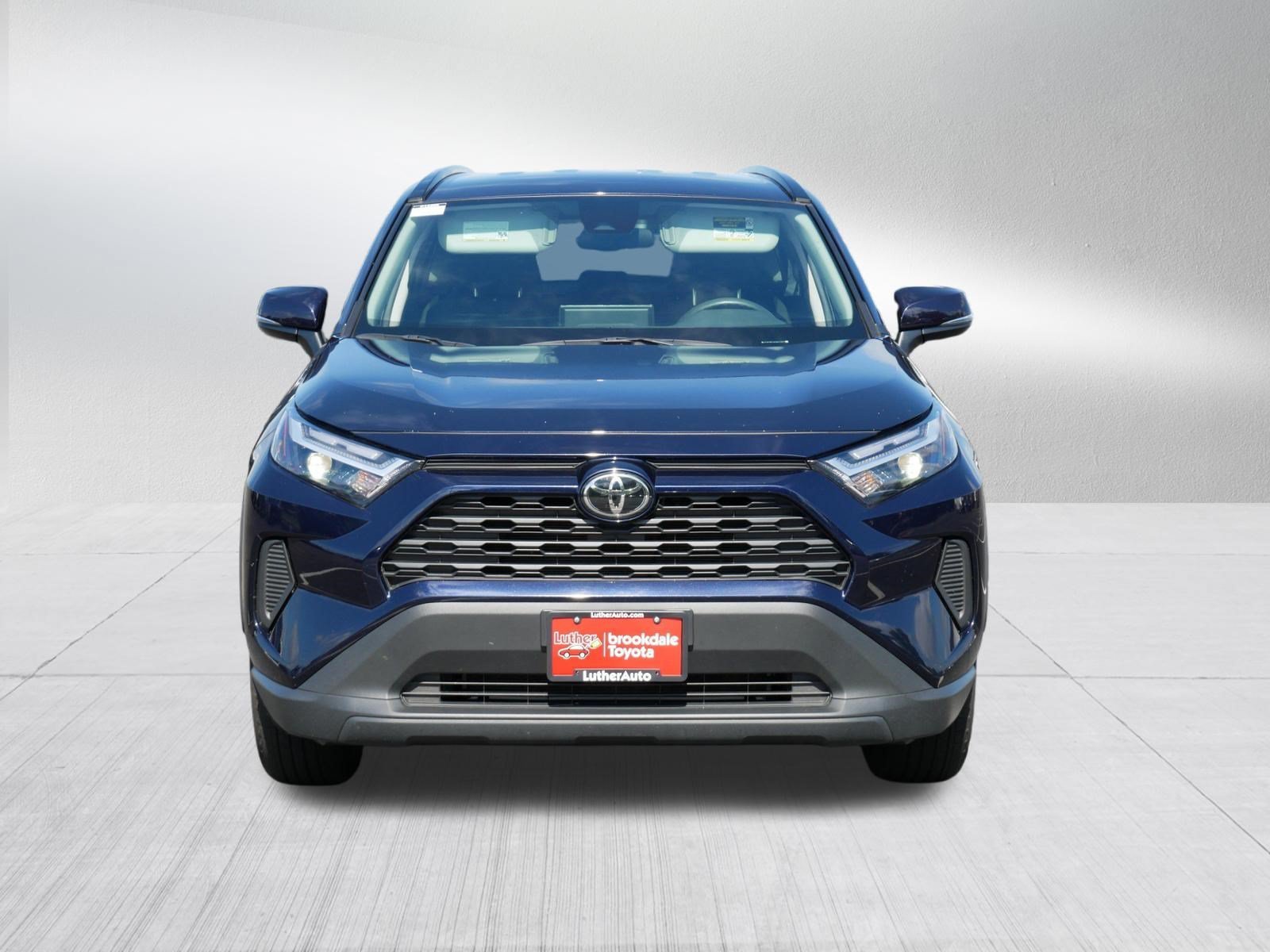 Certified Used 2025 DK. BLUE MC. Toyota XLE image 2