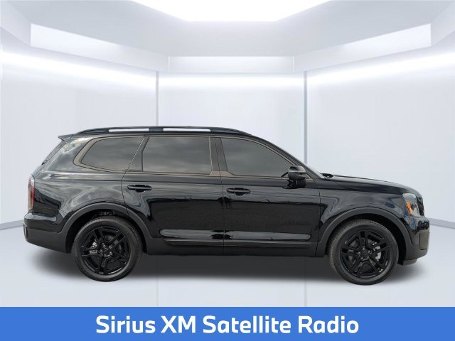 Used 2025 Black Kia EX X-Line image 8