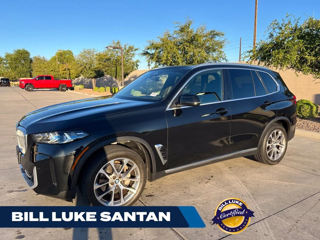 Certified Used 2025 Black BMW sDrive40i image 1