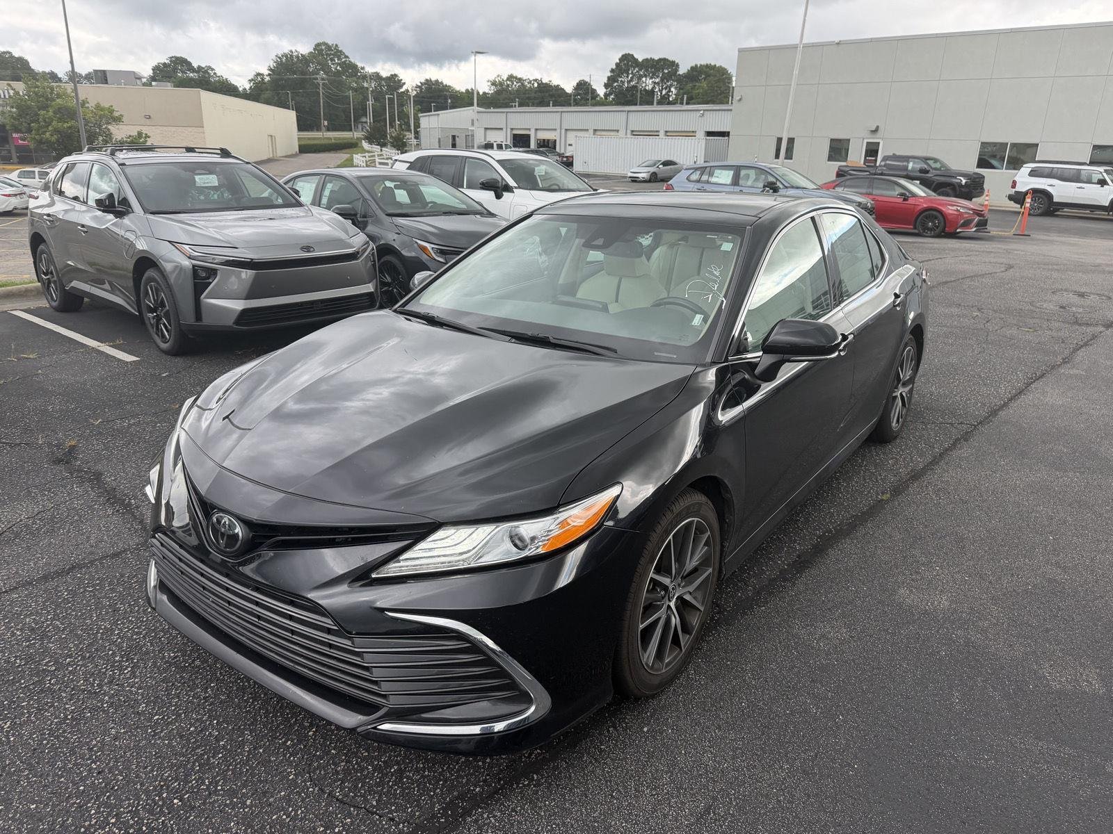 Used 2023 Midnight Black Metallic Toyota XLE image 18
