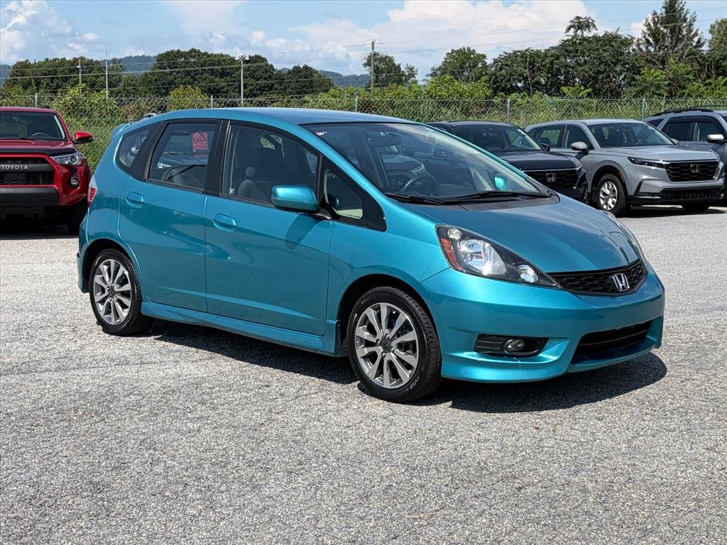 Used 2013 Blue Raspberry Metallic Honda Sport image 1