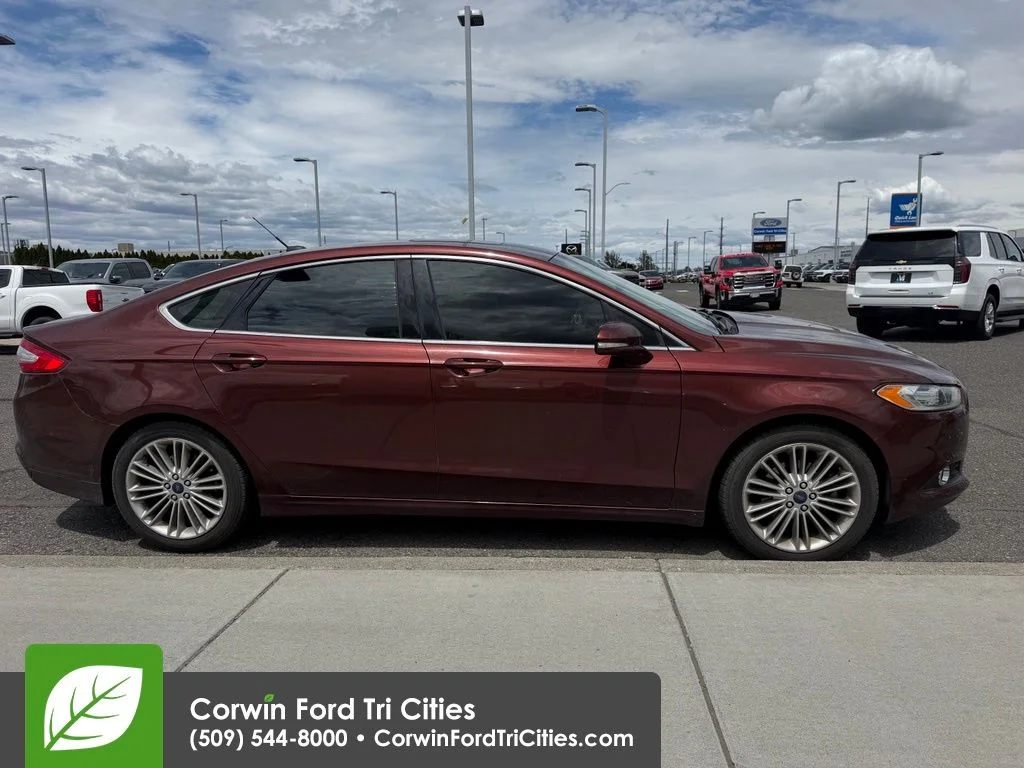 Used 2015 Bronze Fire Metallic Tinted Clearcoat Ford SE image 8