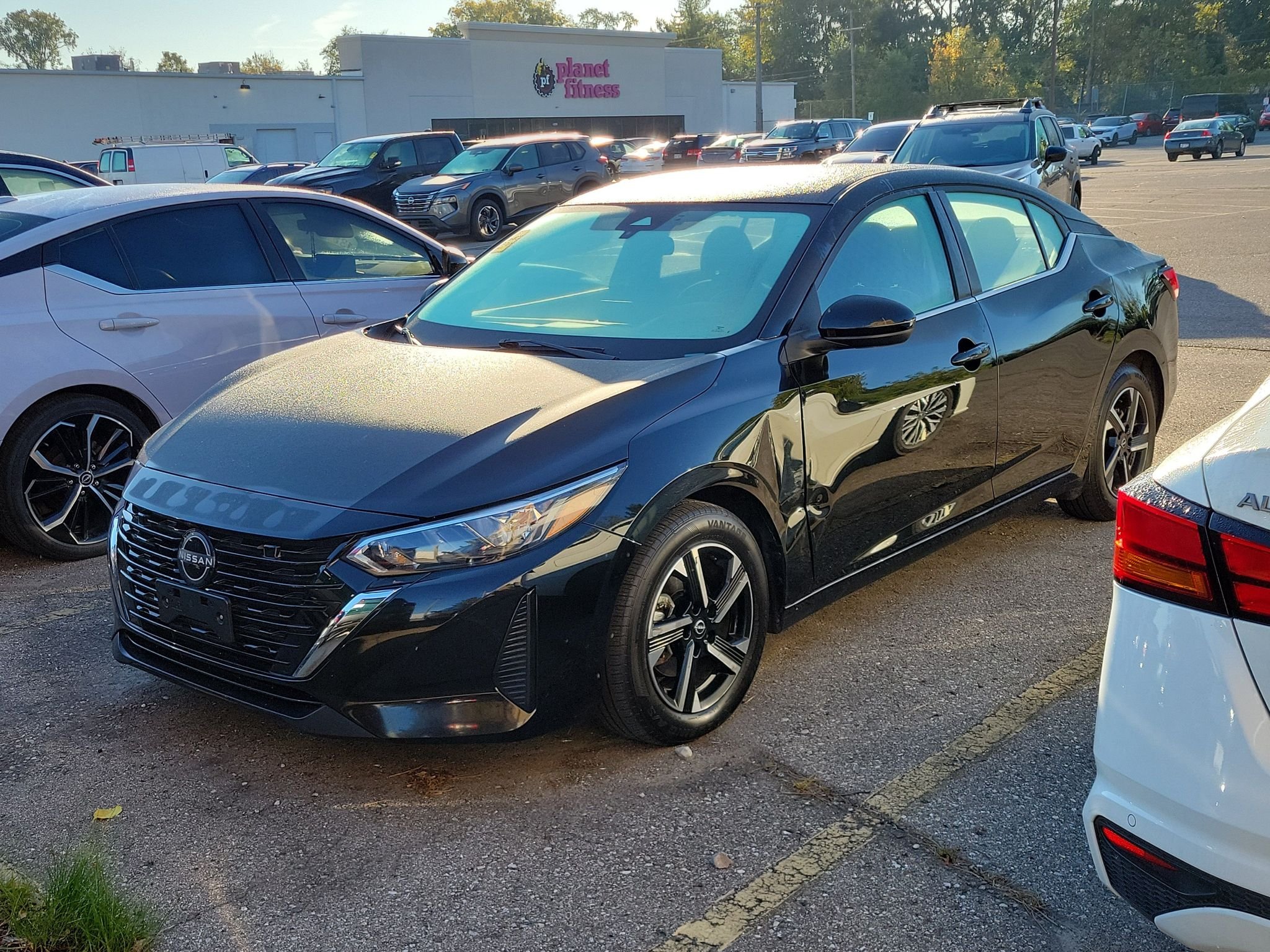 Used 2024 Super Black Nissan SV image 2