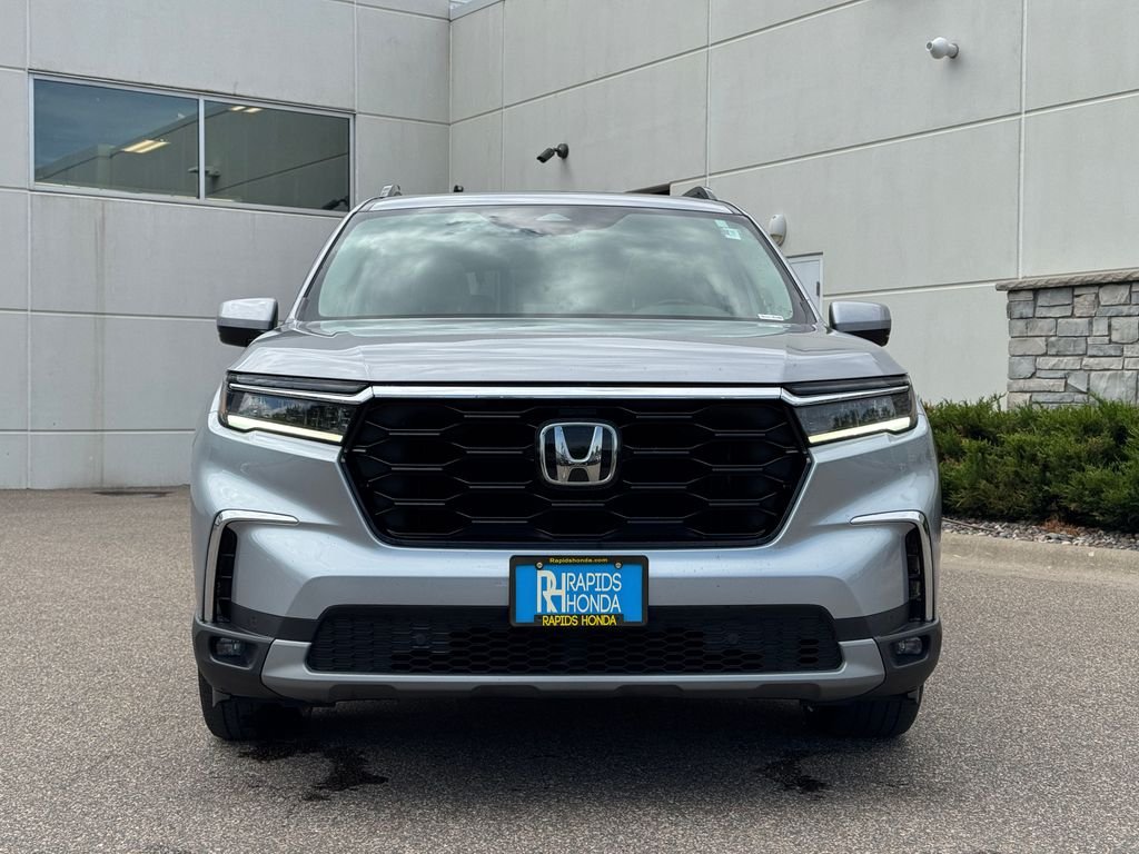 Used 2024 Honda Pilot Touring with VIN 5FNYG1H79RB001524 for sale in Coon Rapids, Minnesota
