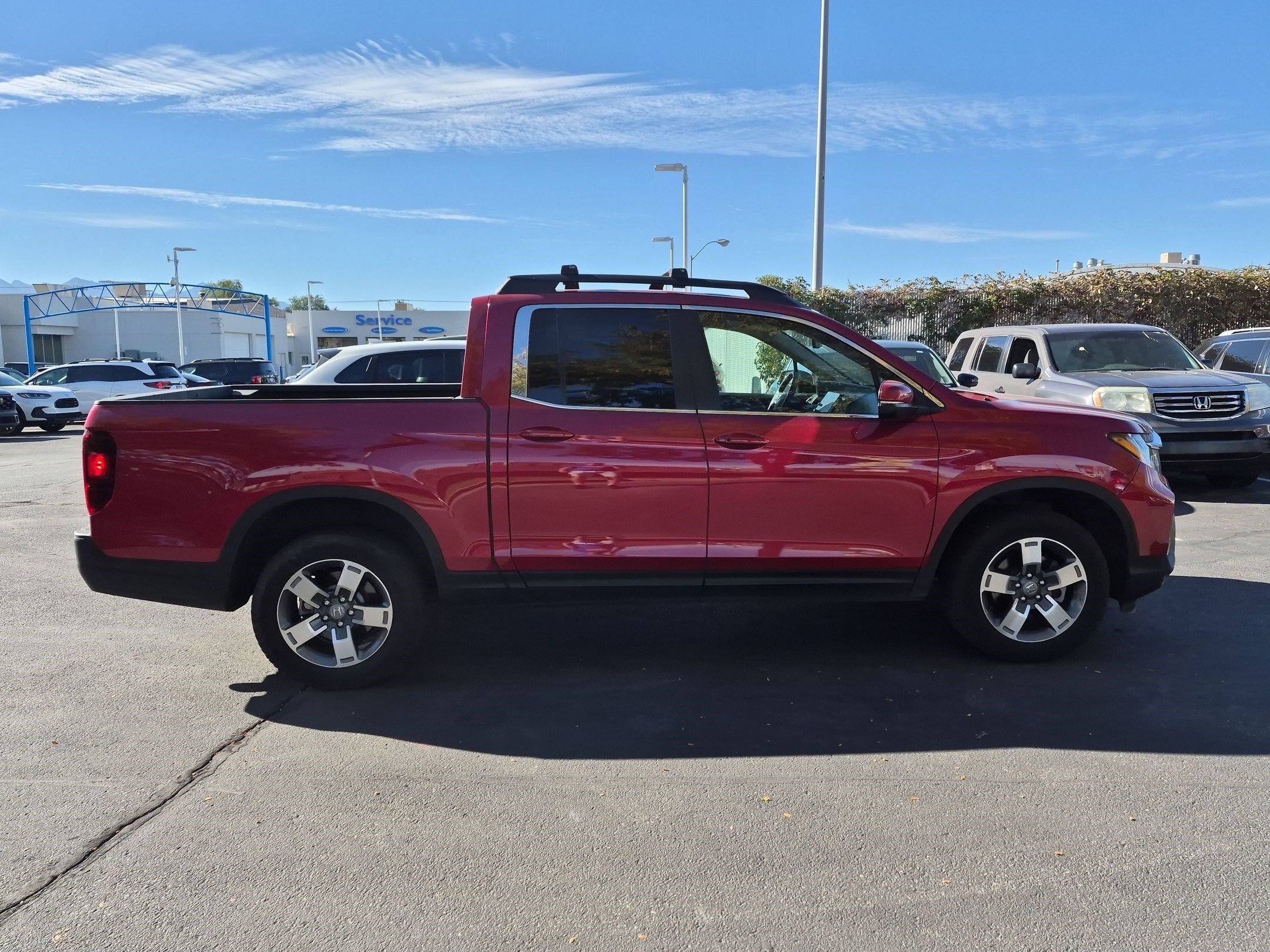 Certified Used 2024 Radiant Red Metallic II Honda AWD RTL image 2