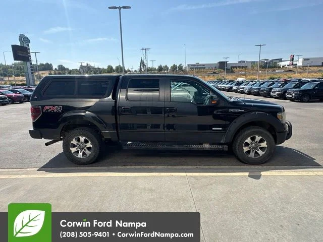 Used 2014 Black Ford FX4 image 4