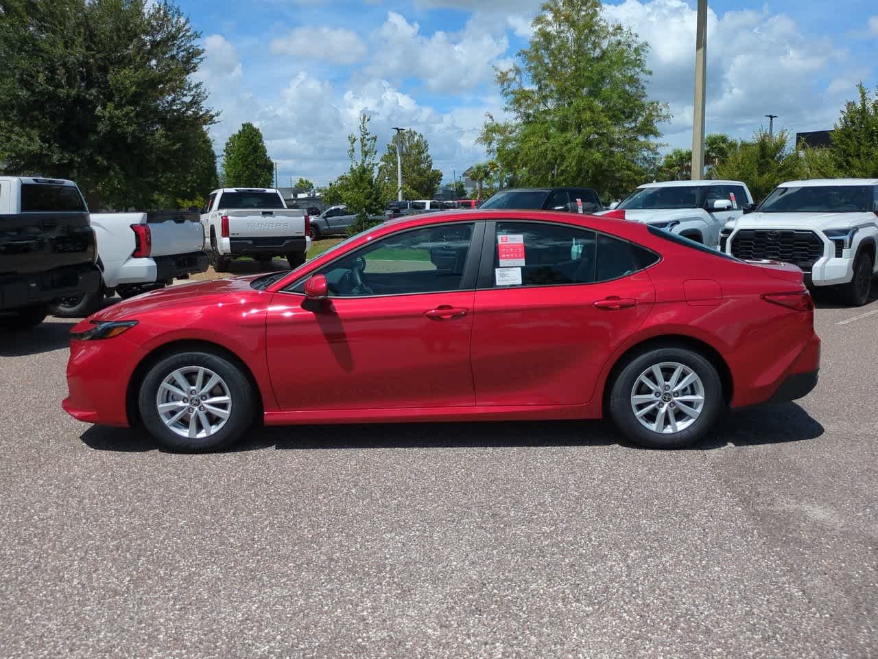 New 2026 Supersonic Red <sup>1</sup> Toyota  LE image 3