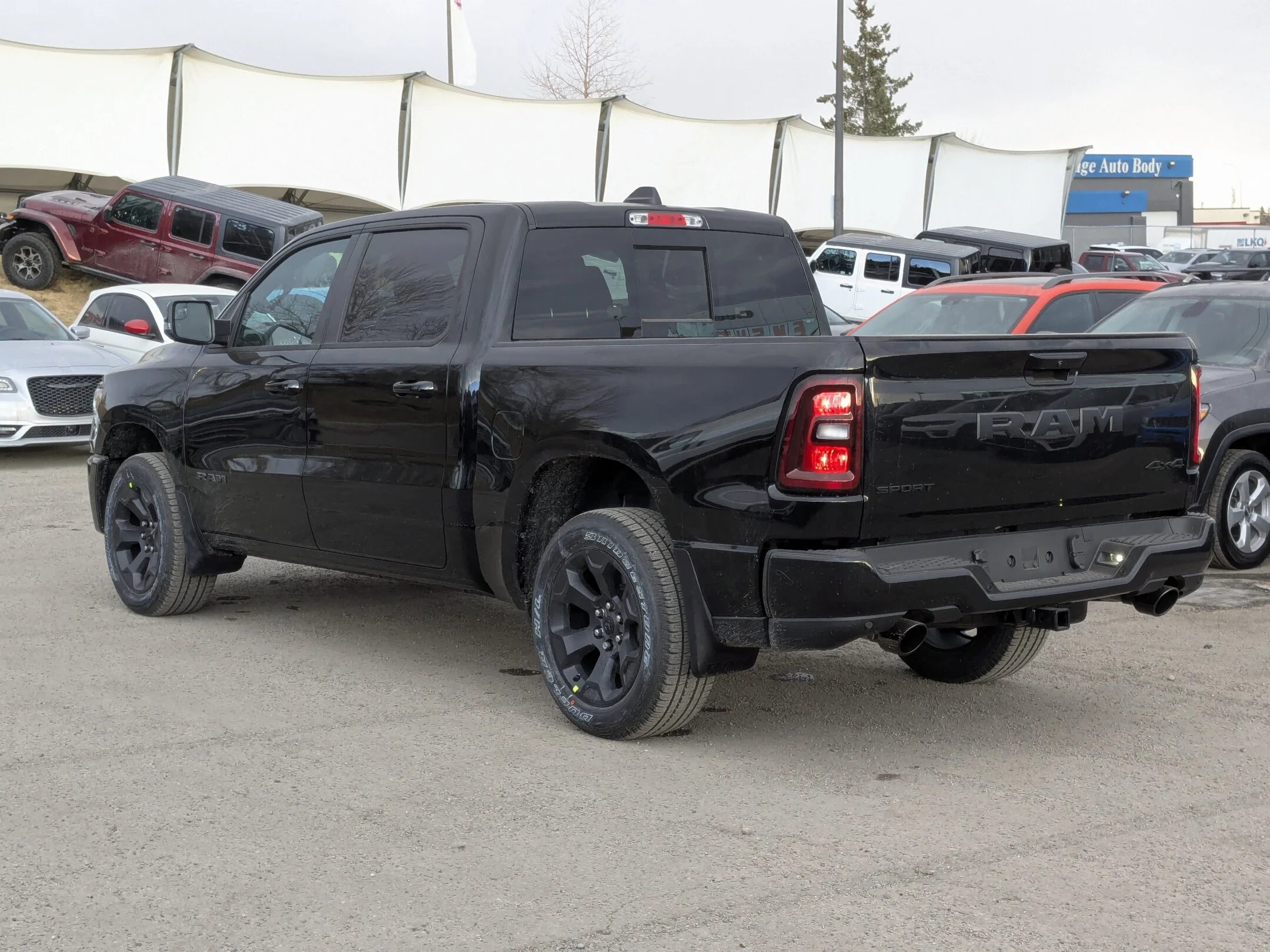 New 2026 Black RAM Sport - - Pano Sunroof - Sport Perf Hood - Anti-Spin Rear Axle - Trailer Brake Control & More! image 6