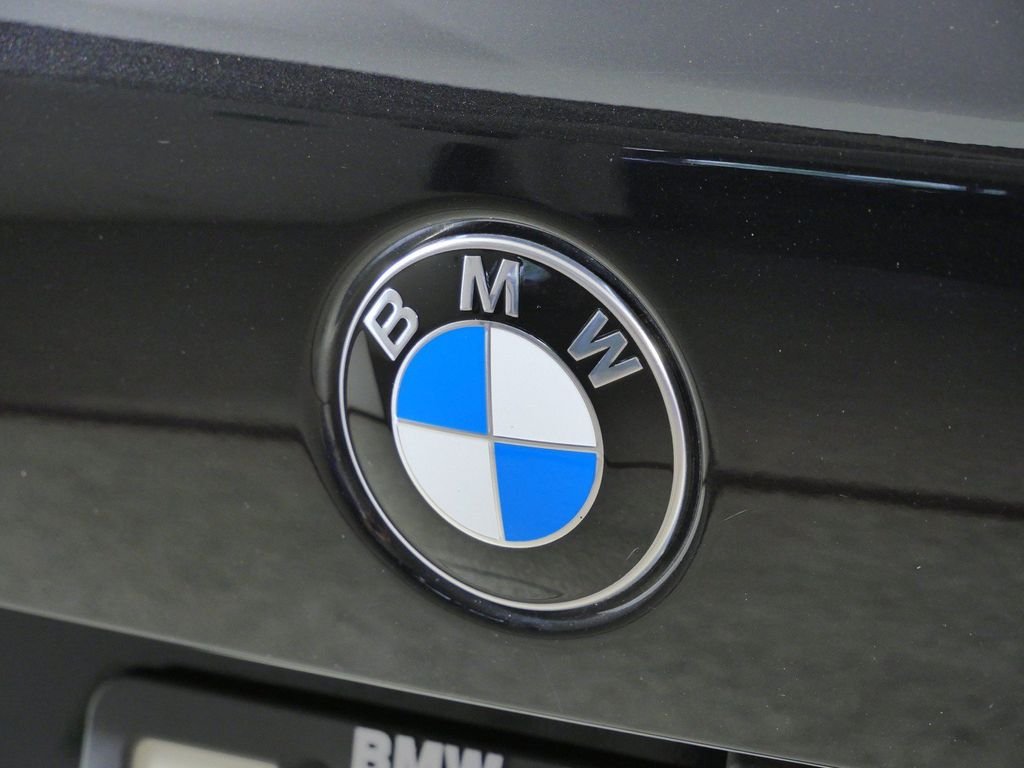 Certified Used 2025 Black Sapphire Metallic BMW xDrive40i image 14