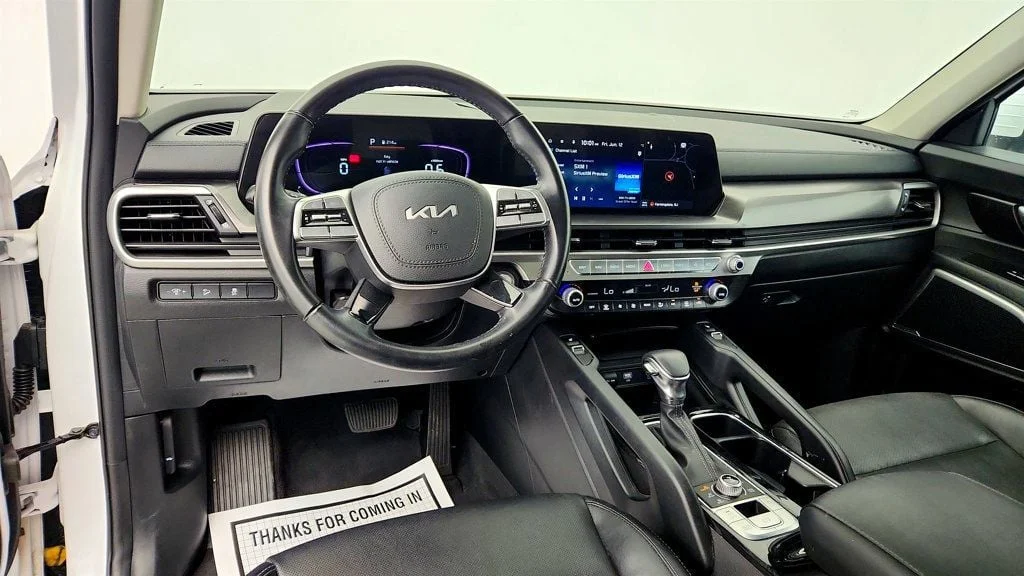 Used 2023 Glacial White Pearl Kia S AWD image 11