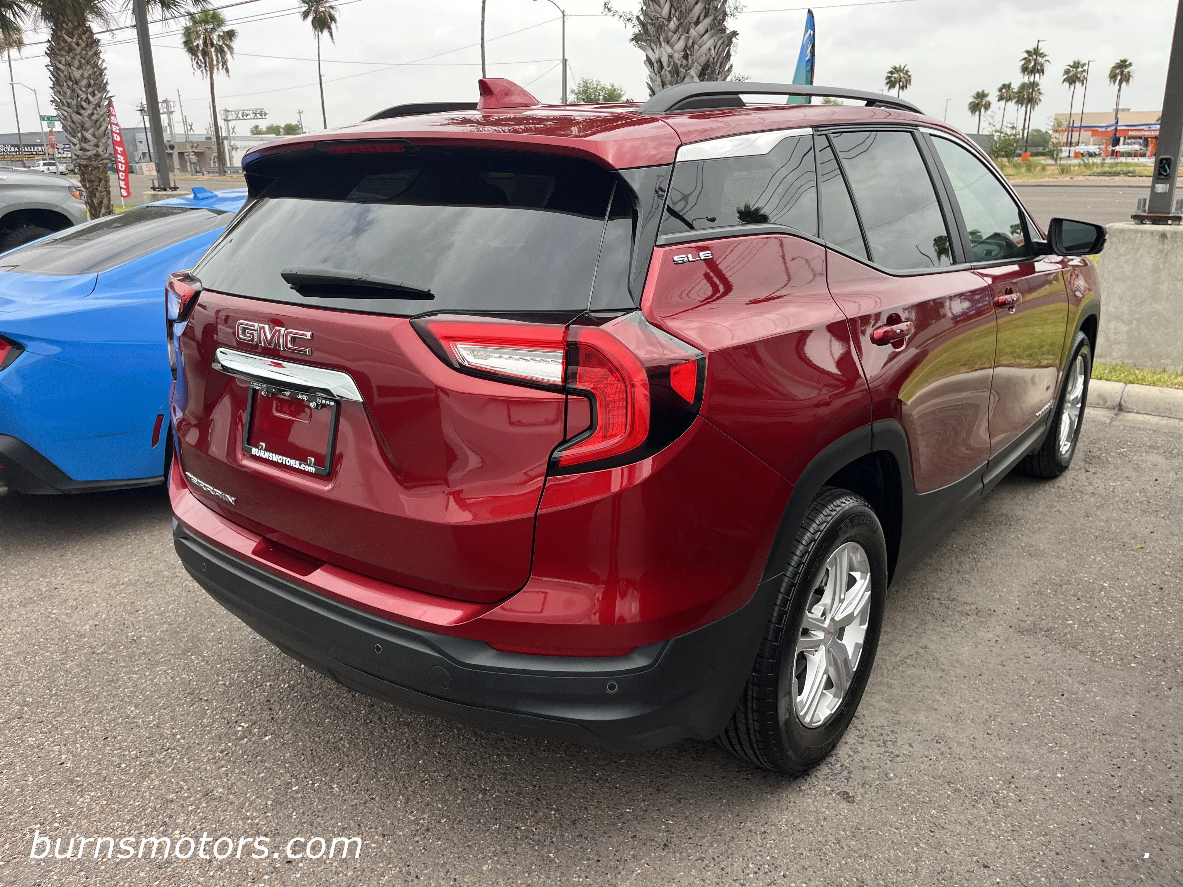Used 2024 Volcanic Red Tint GMC SLE image 7