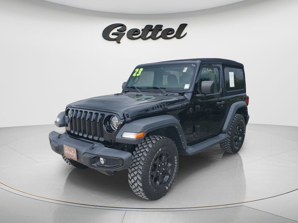 Used 2023 Black Jeep Sport image 1