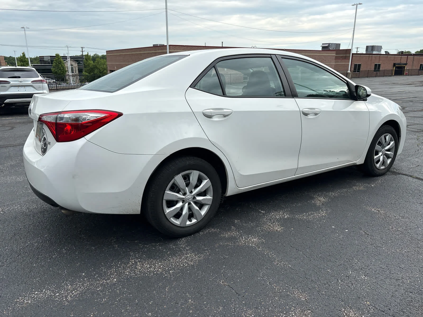 Used 2015 Super White Toyota LE image 12