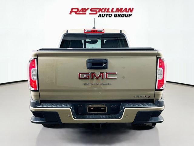 Used 2021 DESERT SAND METALLIC GMC 4WD AT4 w/Leather image 6