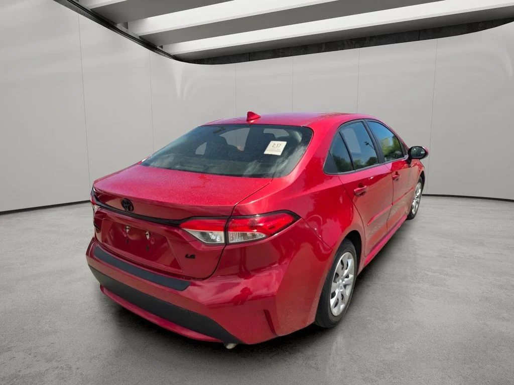 Used 2021 Barcelona Red Metallic Toyota LE image 10