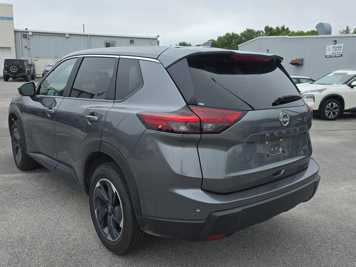 Used 2024 Gun Metallic Nissan SV image 3