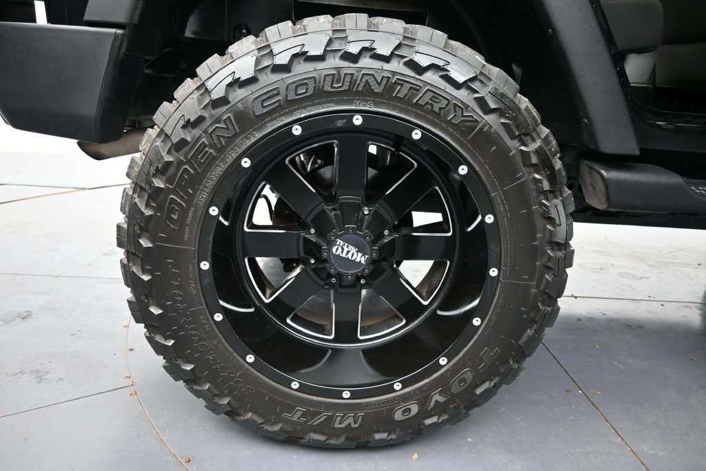Used 2014 Black Clearcoat Jeep Unlimited Sport image 34