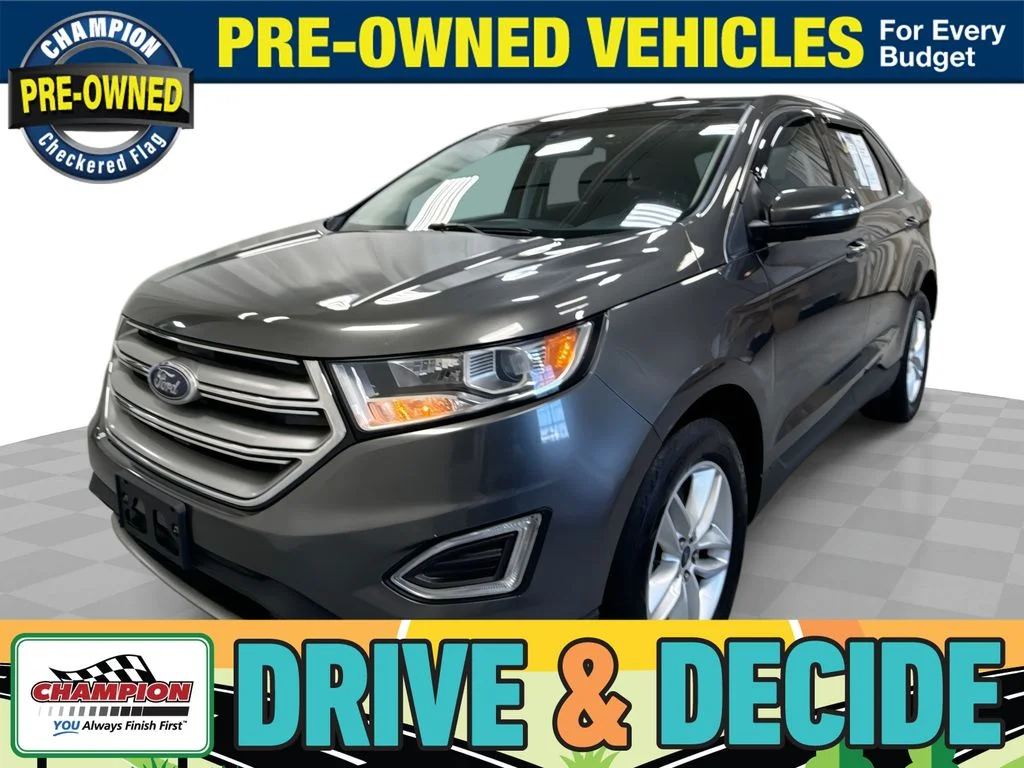 Used 2015 Magnetic Metallic Ford SEL image 1